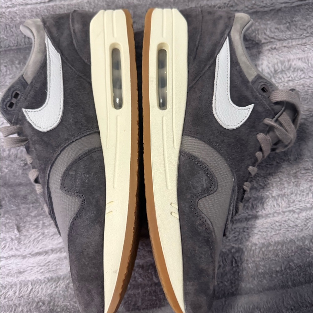 Nike Gray and White Sneakers with Air Max Cushioning